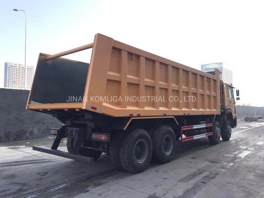 Cnhtc HOWO Sinotruk 8X4 Dump Truck/Tipper Truck/Heavy Duty Truck with 300L Fuel Tanker